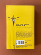 Load image into Gallery viewer, The Program by David Walsh: photo of the back cover which shows minor scuff marks and creasing.