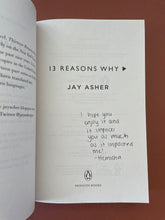 Load image into Gallery viewer, Thirteen Reasons Why by Jay Asher: photo of the Title Page which a previous owner has written the message: "I hope you enjoy it and it impacts you as much as it impacted me! - Hemisha" written in black pen.