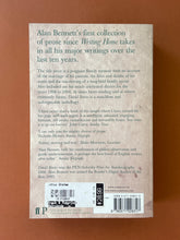 Load image into Gallery viewer, Untold Stories by Alan Bennett: photo of the back cover which shows very minor scuff marks along the edges.