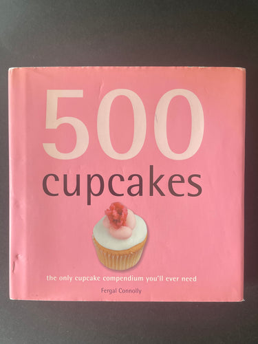 500 Cupcakes by Fergal Connolly: photo of the front cover which shows scuff marks on the dust jacket.