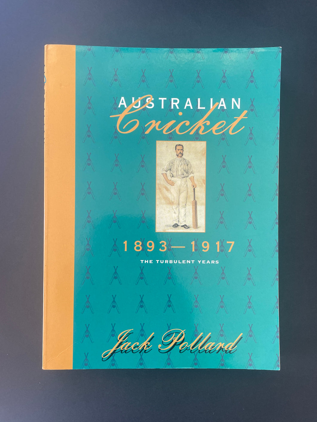 Australian Cricket-The Turbulent Years (1893-1917) by Jack Pollard: photo of the front cover which shows very minor scuff marks, creasing, and scratches.