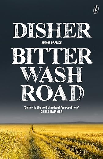 Book cover of 'Bitter Wash Road' by Garry Disher with a yellow field and road on a dark background.
