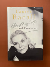 Load image into Gallery viewer, By Myself and Then Some by Lauren Bacall: photo of the front cover which shows minor scuff marks along the edges, and a small (about 2cm) tear on the dust jacket, along the bottom edge. No other tearing.
