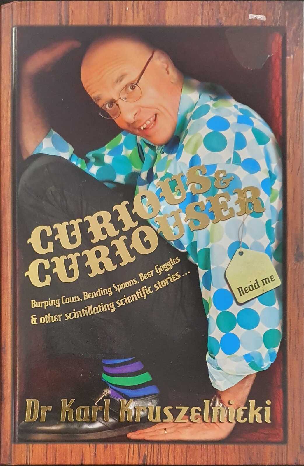 Curious & Curiouser by Dr Karl Kruszelnicki: stock image of front cover.