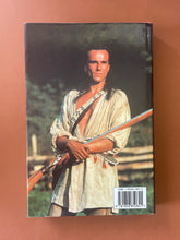 Load image into Gallery viewer, Daniel Day-Lewis-The Biography by Laura Jackson: photo of the back cover which shows minor scuff marks along the edges, and very minor scratching.
