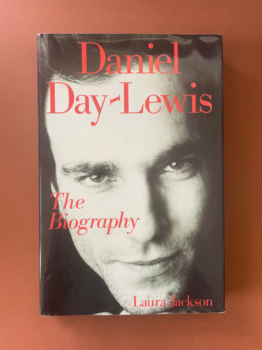 Daniel Day-Lewis-The Biography by Laura Jackson: photo of the front cover which shows very minor scuff marks along the edges of the dust jacket.