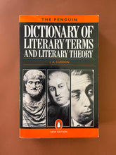 Load image into Gallery viewer, Dictionary of Literary Terms and Literary Theory by J. A. Cuddon: photo of the front cover which shows minor creasing and scuff marks along the edges.
