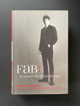 Load image into Gallery viewer, Fab-An Intimate Life of Paul McCartney by Howard Sounes: photo of the front cover which shows very minor scuff marks along the edges of the dust jacket, and minor scratches.
