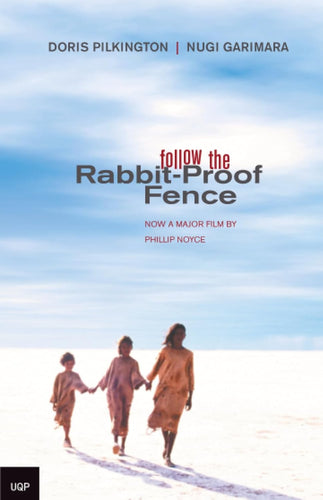 Book cover of 'Follow the Rabbit-Proof Fence' by Doris Pilkington, & Nugi Garimara with three people walking on a white background