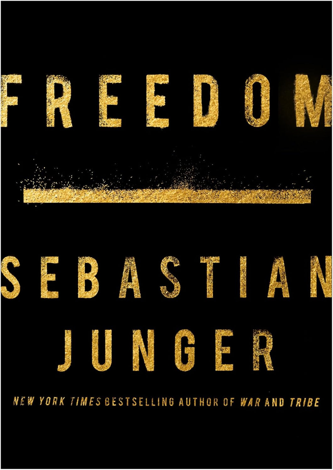 Book cover of 'Freedom' by Sebastian Junger with gold text on a black background