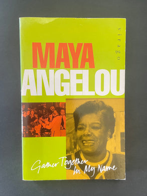 Book cover of 'Gather Together in My Name' by Maya Angelou with a green background and portrait. The photo shows minor scuff marks along the edges, and a minor crease along the top of the cover.