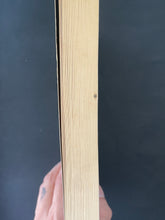 Load image into Gallery viewer, Hood Rat by Gavin Knight: photo of the book's fore-edge which shows a very small black stain, which is mostly only visible on the fore-edge of the book when book is shut, and a tiny bit on the edge of a very small handful of pages.
