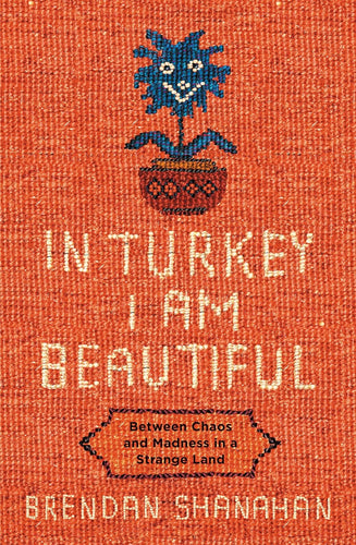 Book cover of 'In Turkey I Am Beautiful' by Brendan Shanahan with a decorative design and text on an orange background.