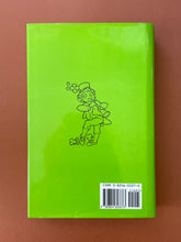 Load image into Gallery viewer, Joys of Irish Humor by Henry D. Spalding: photo of the back cover which shows very minor scuff marks along the edges of the dust jacket.
