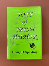 Load image into Gallery viewer, Joys of Irish Humor by Henry D. Spalding: photo of the front cover which shows very minor scuff marks along the edges of the dust jacket.
