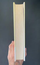 Load image into Gallery viewer, Kant and the Platypus by Umberto Eco: photo of the fore-edge which shows tiny spots of discolouring.
