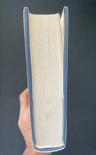 Load image into Gallery viewer, Kant and the Platypus by Umberto Eco: photo of the bottom-edge which shows very minor, tiny, blotches of discolouring.
