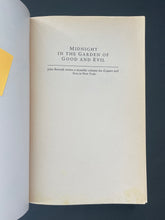 Load image into Gallery viewer, Midnight in the Garden of Good and Evil by John Berendt: photo of the title page which shows a very minor, faint blotch of discolouring on the bottom-right corner.
