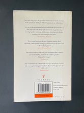 Load image into Gallery viewer, Midnight in the Garden of Good and Evil by John Berendt: photo of the back cover which shows very minor scuff marks and minor creasing along the edges.
