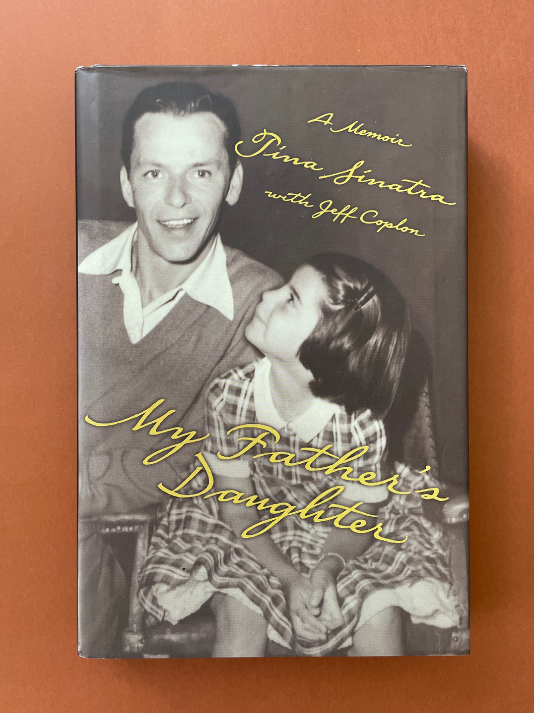 My Father's Daughter by Tina Sinatra: photo of the front cover which shows very minor scuff marks along the edges.