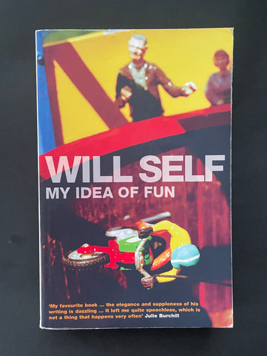 Book cover of 'My Idea of Fun' by Will Self with colourful illustration on a dark background. The photo shows minor scuff marks along the edges.