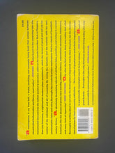 Load image into Gallery viewer, Naked Lunch by William Burroughs: photo of the back cover which shows creasing and scuff marks .
