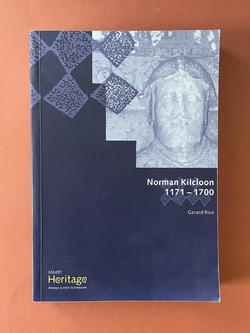 Norman Kilcloon 1171-1700 by Gerard Rice: photo of the front cover which shows minor scuff marks and scratches.