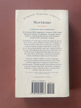Load image into Gallery viewer, Nostromo by Joseph Conrad: photo of the back cover which shows minor scuff marks and creasing along the edges, and minor scratching.
