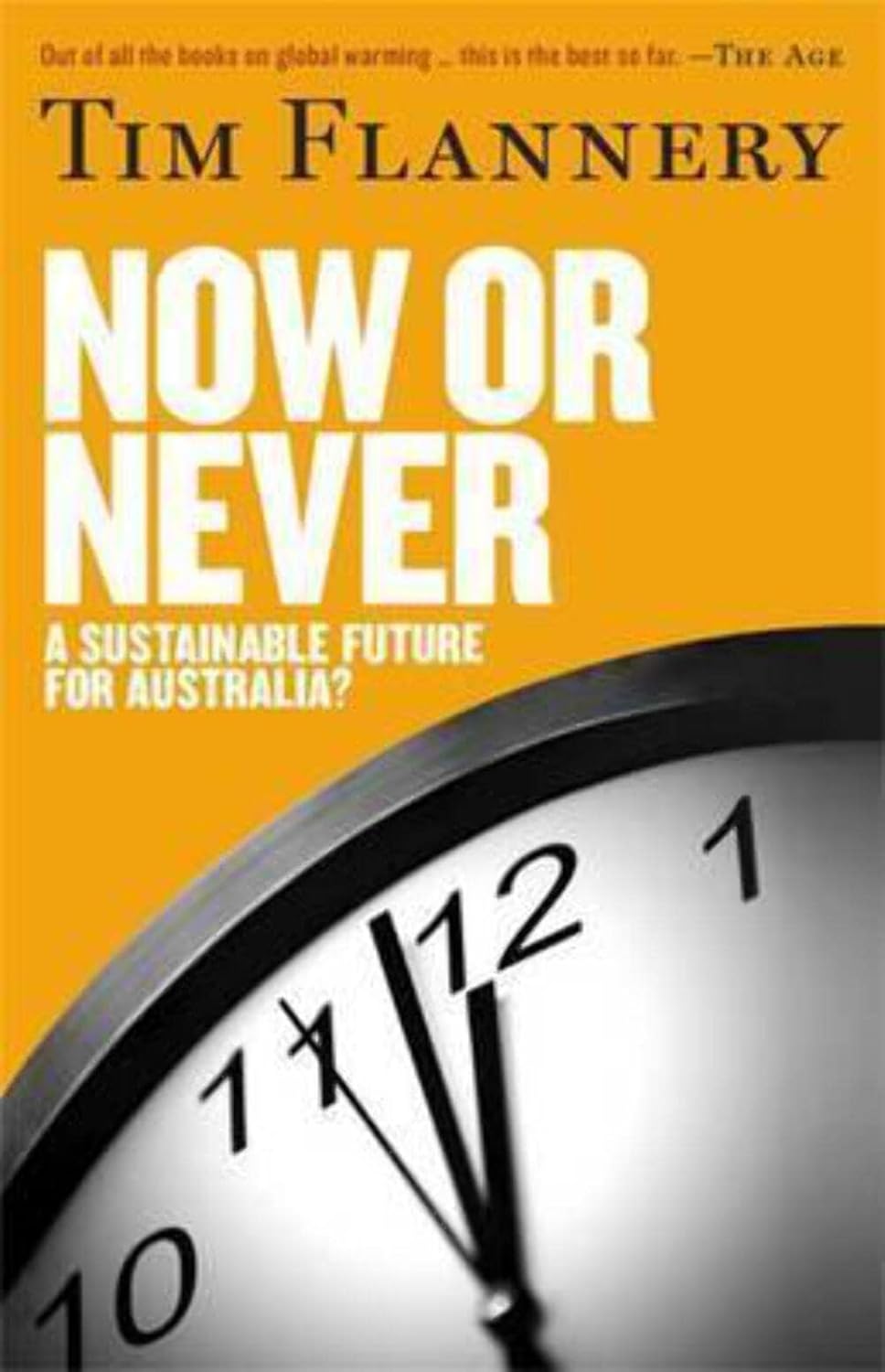 Book cover for 'Now or Never' by Tim Flannery featuring a clock over a yellow background and white and black text.