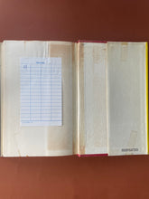 Load image into Gallery viewer, One Day in the Life of Ivan Denisovich: photo of the last page, which has discoloured with age and has a library card glued to it. And the inside of the backc over, which has discoloured some with age.
