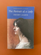 Load image into Gallery viewer, Portrait of a Lady by Henry James: photo of the front cover which shows very minor scuff marks along the edges.
