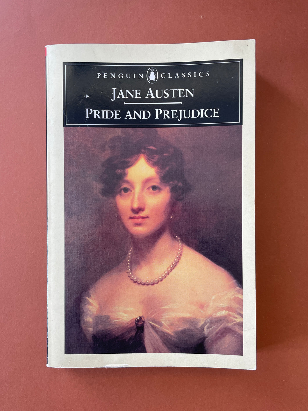 Pride and Prejudice by Jane Austen: photo of the front cover which shows minor scuff marks, creasing and scratches.