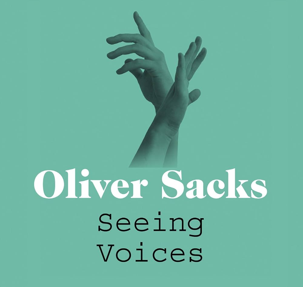 Book cover of 'Seeing Voices' by Oliver Sacks with a teal background and hands in the air.