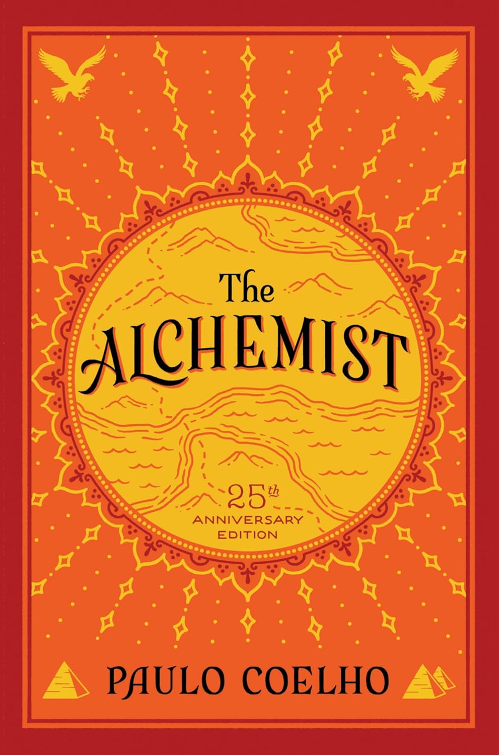 Book cover of 'The Alchemist' by Paulo Coelho with an orange background and yellow text.