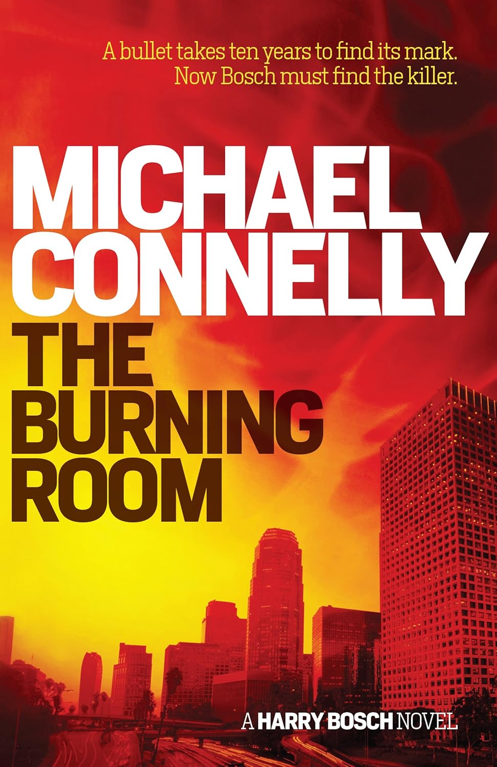 Book cover of 'The Burning Room' by Michael Connelly with a cityscape background.