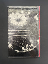 Load image into Gallery viewer, The Experience of Opera by Paul Henry Lang: photo of the back cover which shows air pockets under the clear plastic dust jacket.
