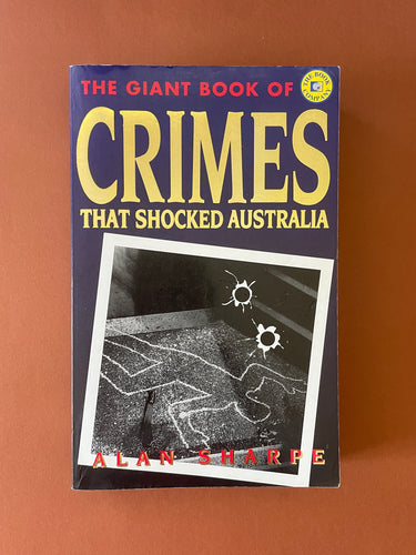 The Giant Book of Crimes That Shocked Australia by Alan Sharpe: photo of front cover which shows very minor scuff marks, creasing, and scratches.