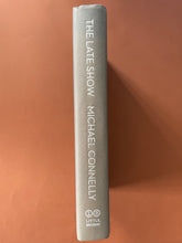 Load image into Gallery viewer, The Late Show by Michael Connelly: photo of the spine which shows very minor scuff marks along the edges.
