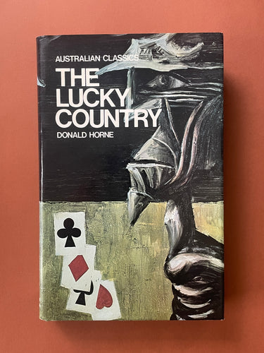 The Lucky Country by Donald Horne: photo of the front cover which shows minor scuff marks along the edges.