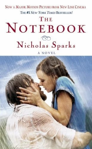 Book cover for 'The Notebook' by Nicholas Sparks with a picture of a man and woman kissing in the rain.