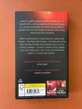 Load image into Gallery viewer, The Suspect by Michael Robotham: photo of the back cover.
