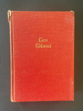 Load image into Gallery viewer, The Works of Leo Tolstoi by Leo Tolstoi: photo of the front cover which shows scuff marks along the edges, and a tear on the top-left corner.
