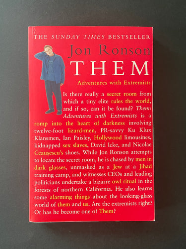 Them-Adventures with Extremists by Jon Ronson: photo of the front cover which shows very minor scuff marks along the edges.