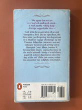 Load image into Gallery viewer, Three Men in a Boat by Jerome K. Jerome: photo of the back cover which shows a fair amount of creasing and scuff marks.
