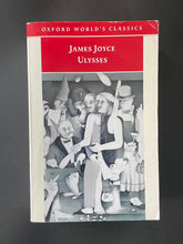 Load image into Gallery viewer, Ulysses by James Joyce: photo of the front cover which shows some creasing and minor scuff marks.
