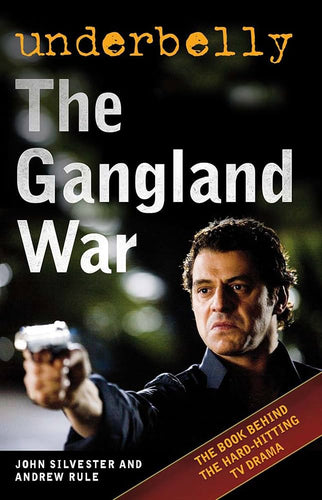 Book cover of 'The Gangland War' by John Silvester and Andrew Rule with a man holding a gun, featuring the title and authors' names.