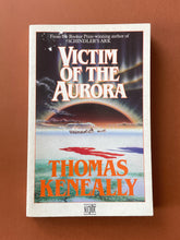 Load image into Gallery viewer, Victim of the Aurora by Thomas Keneally: photo of the front cover which shows minor scuff marks on the top-left corner, and very minor general wear, caused by age.

