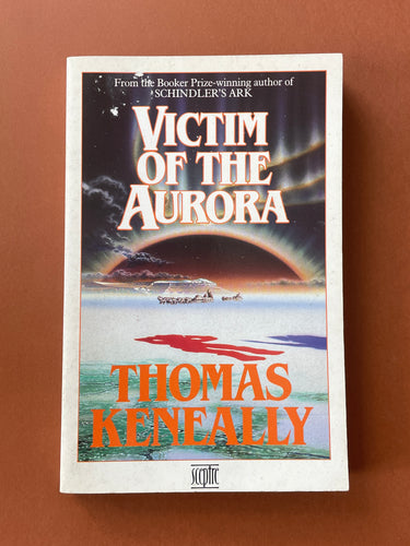 Victim of the Aurora by Thomas Keneally: photo of the front cover which shows minor scuff marks on the top-left corner, and very minor general wear, caused by age.
