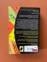 Load image into Gallery viewer, A Brief History of Seven Killings by Marlon James: photo of the back cover which shows very minor (barely visible) scuff marks along the edges.
