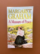 Load image into Gallery viewer, A Measure of Peace by Margaret Graham: photo of the front cover which shows very minor scuff marks along the edges, and an obvious crease on the top-right corner.
